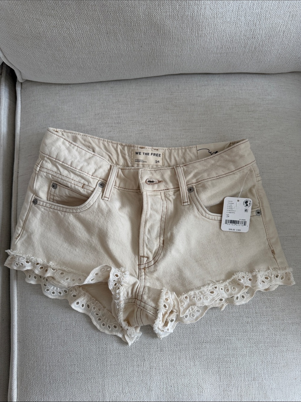 Free People ivory denim shorts